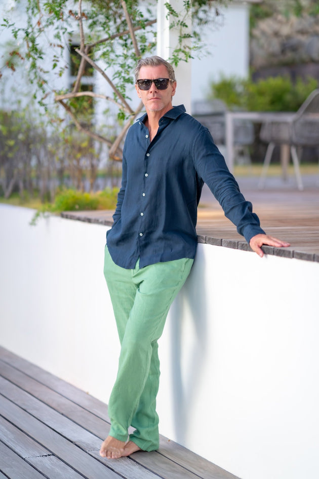 Man in light green Nicolas linen trousers and shirt