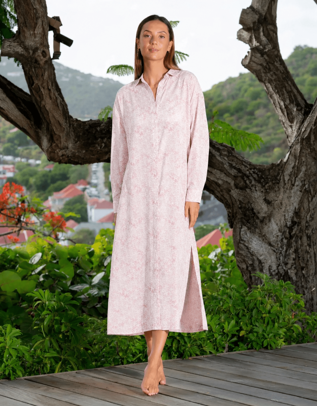 Woman in pink Palms print Kate shirt dress
