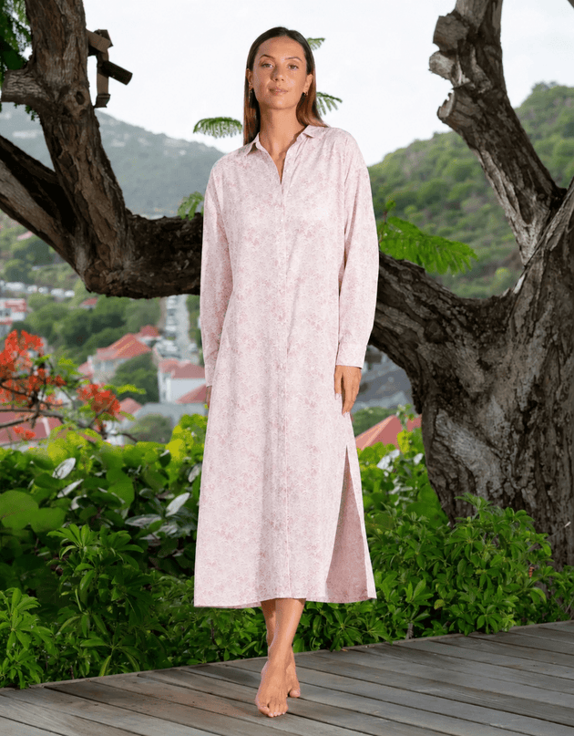 Woman in pink Palms print Kate shirt dress